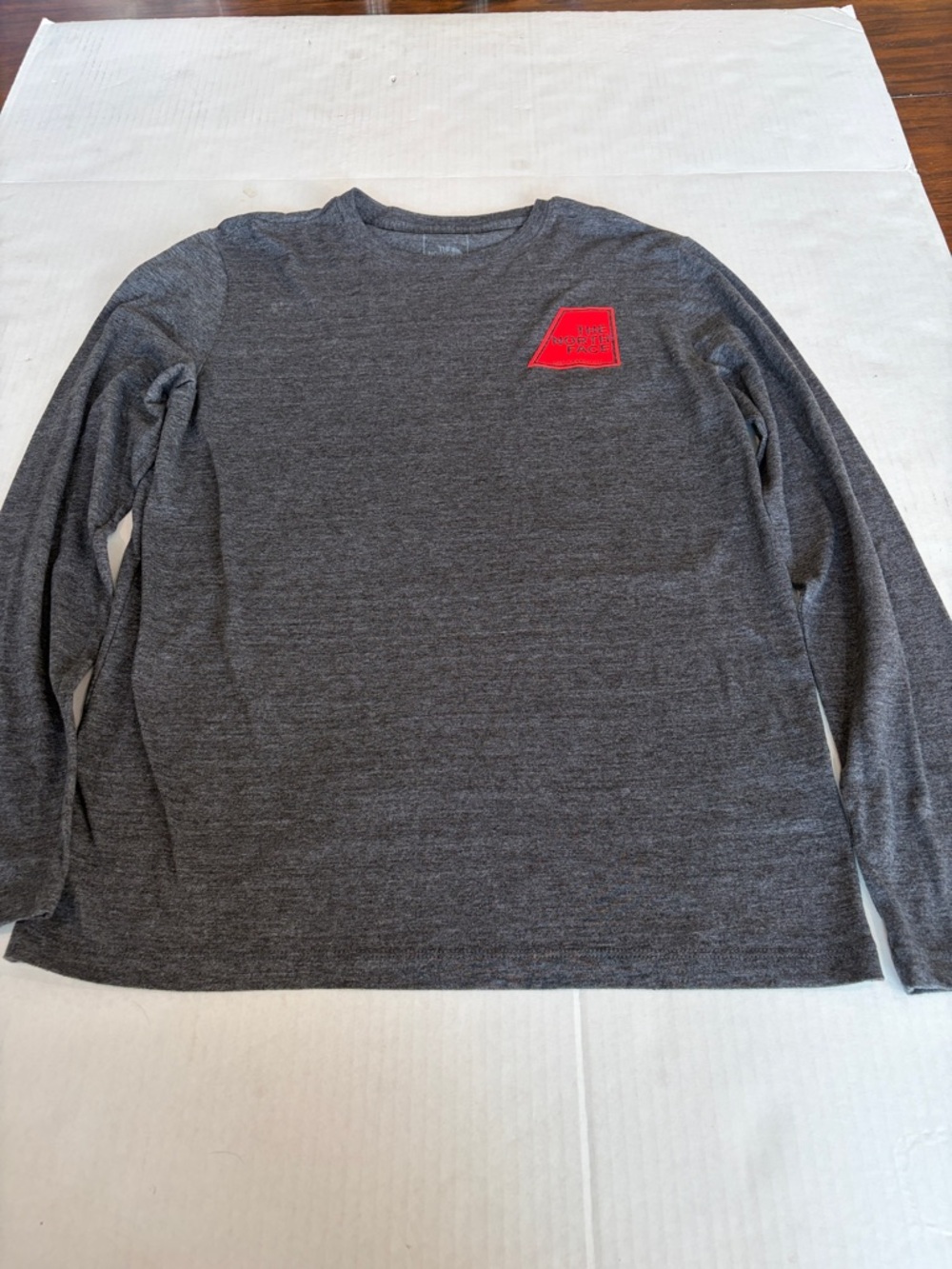 The North Face Men's Dark Gray Long-Sleeve Crew with Red Logo Patch
